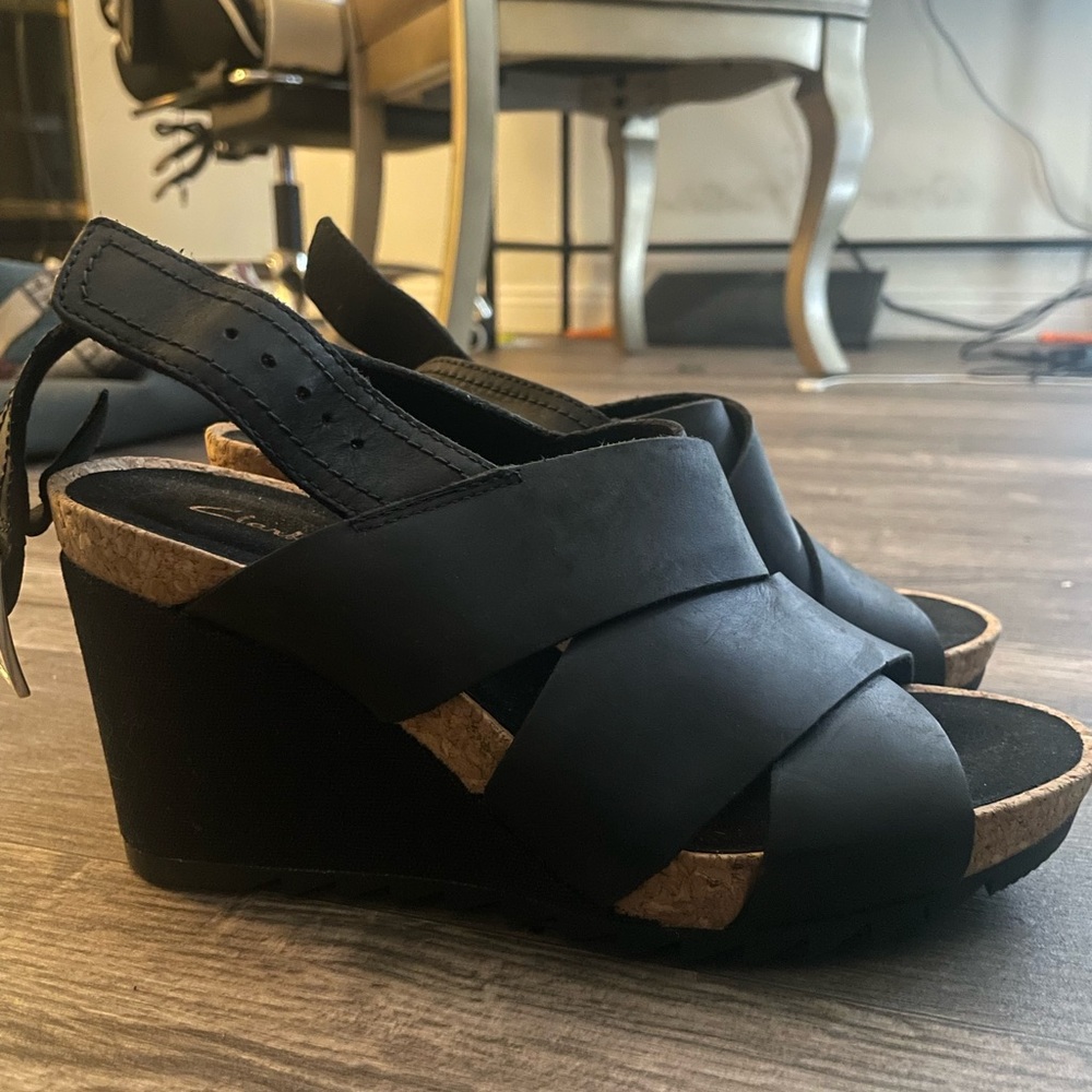 Clark’s black wedges. Used once